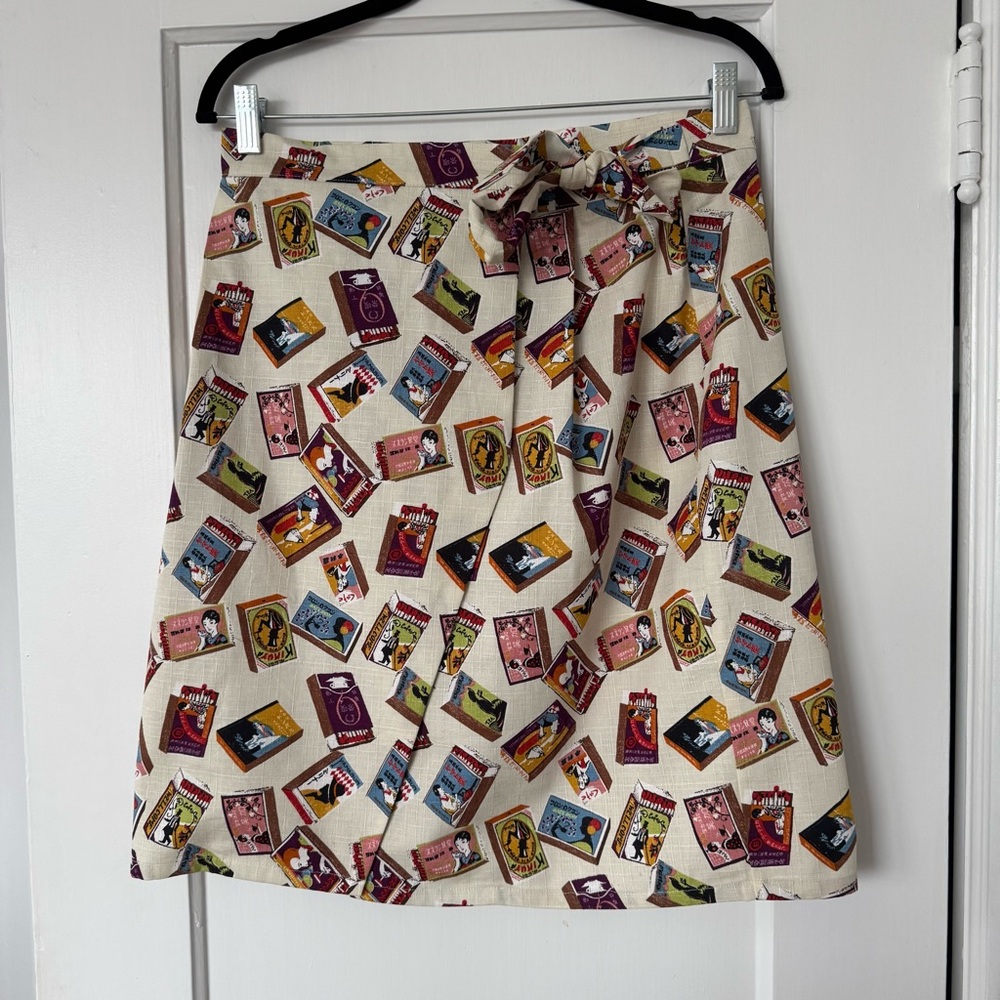 Matchbook print wrap skirt